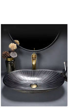 Charger l'image dans la galerie, lavabo en céramique couleur or avec motif de fleur
